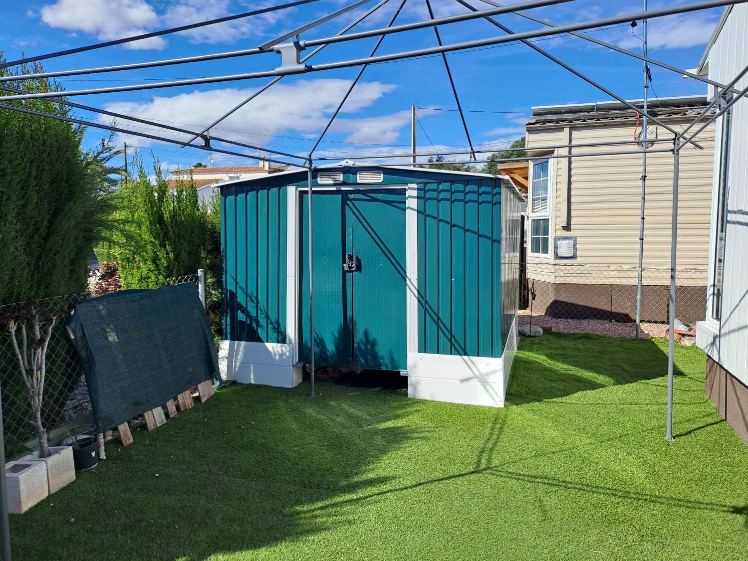 Unique BK Senator mobile home with extension and stoarge sheds