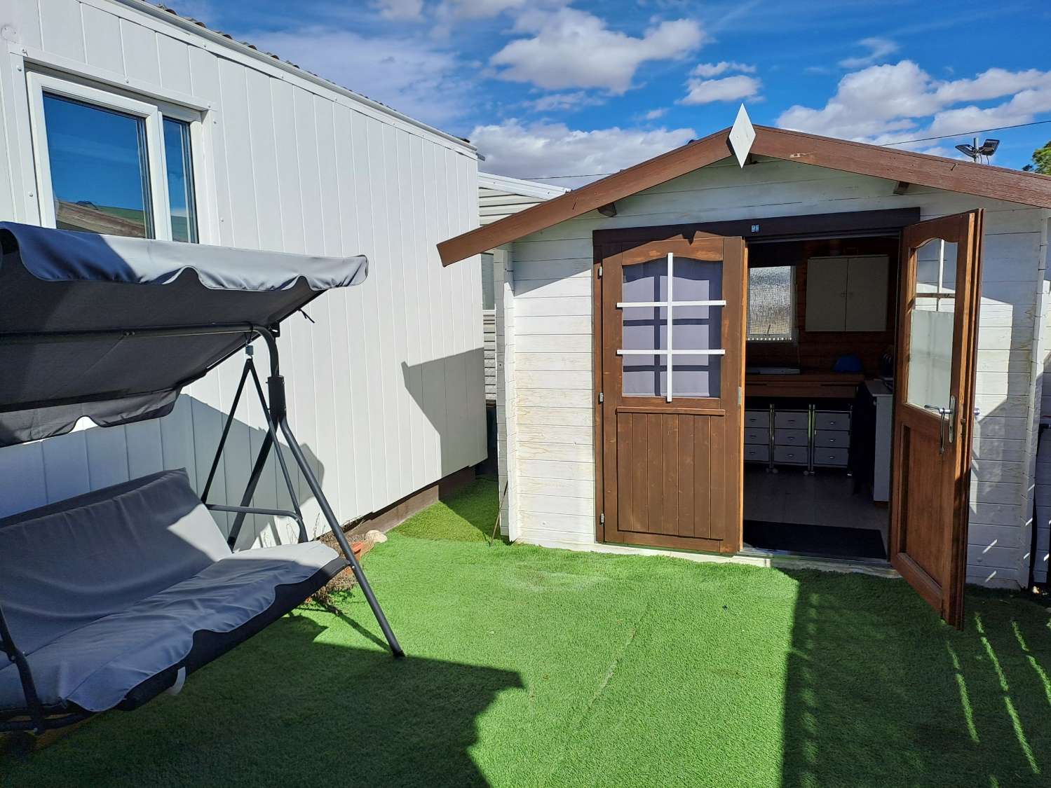 Unique BK Senator mobile home with extension and stoarge sheds