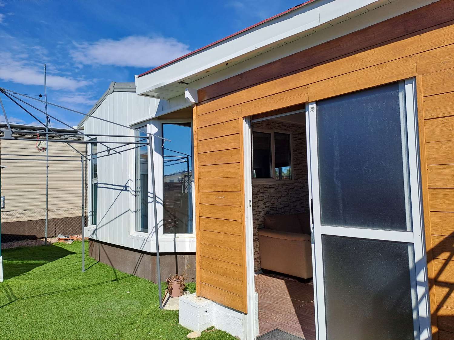 Unique BK Senator mobile home with extension and stoarge sheds