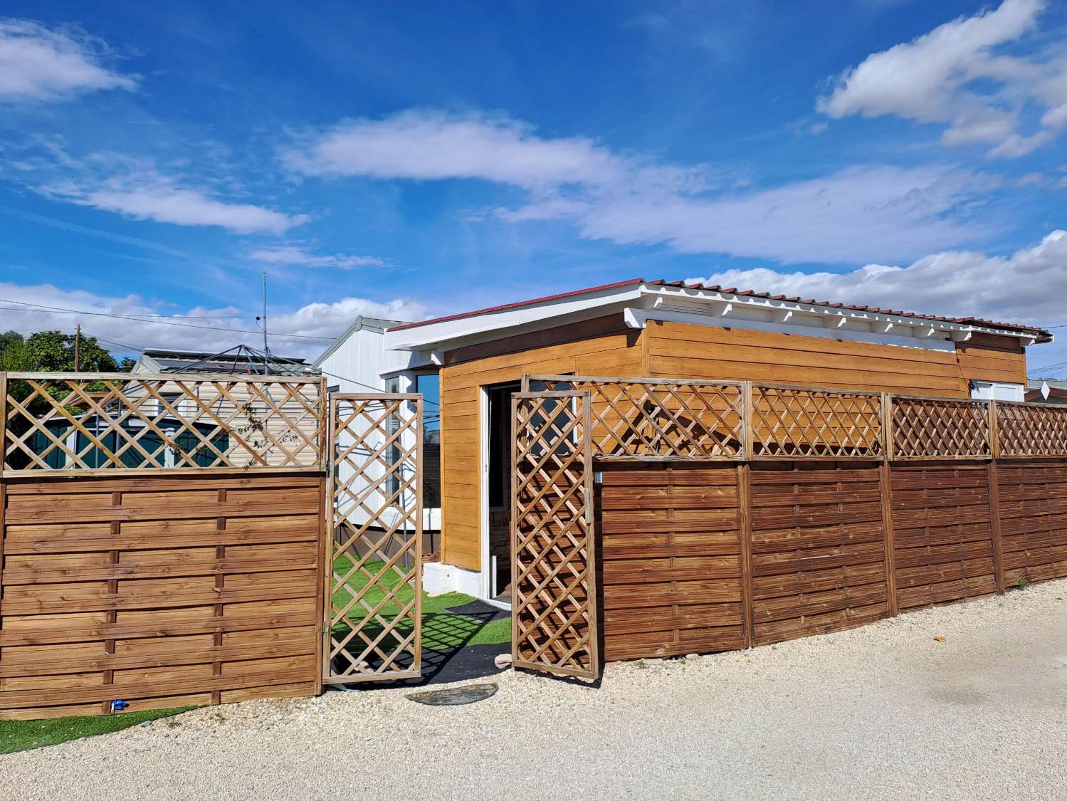 Unique BK Senator mobile home with extension and stoarge sheds