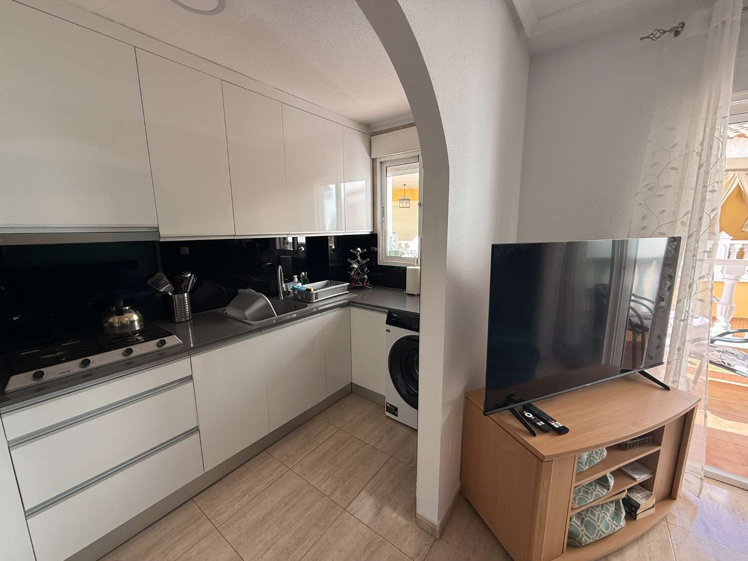 Beautiful First Floor Apartment With Spacious Private Solarium and Communal Pool in the Heart of Catral