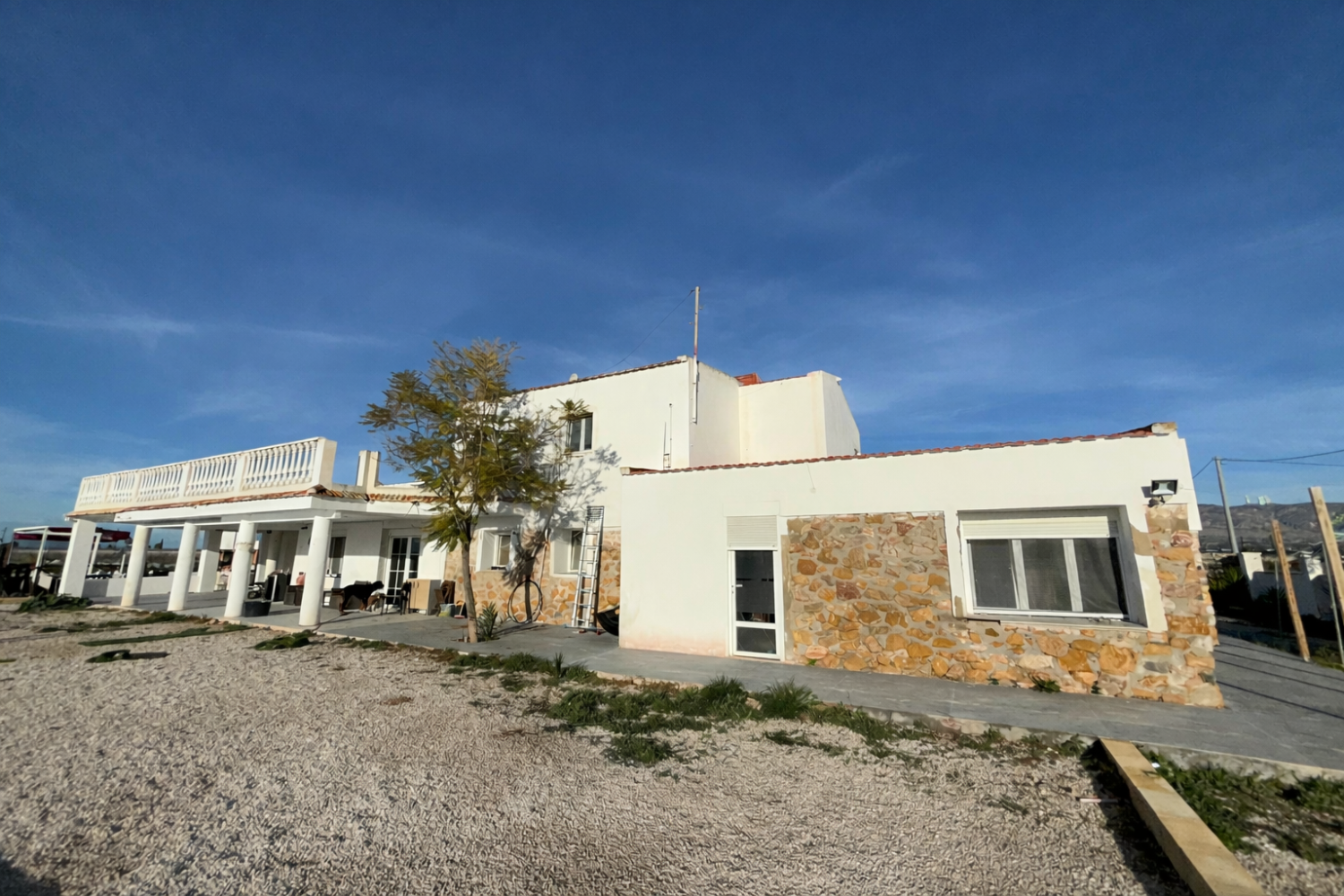 A large country house with pool and mountain views