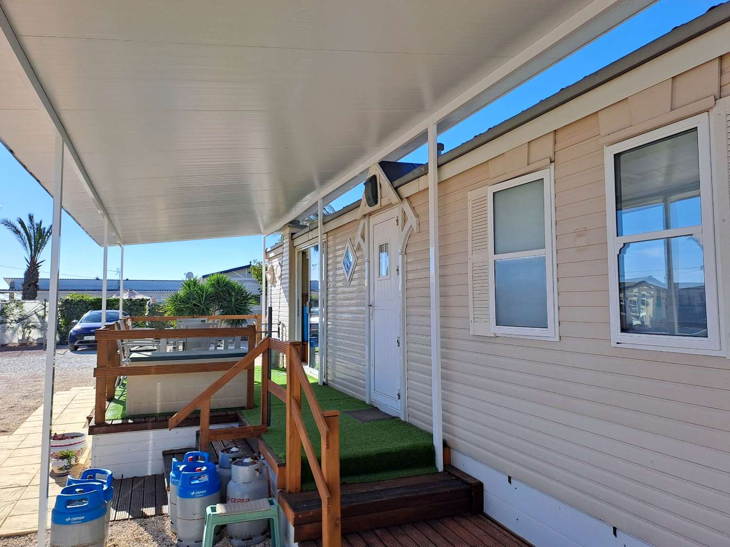 A great 2 bed Atlas Super Oakwood with decking and outside kitchen