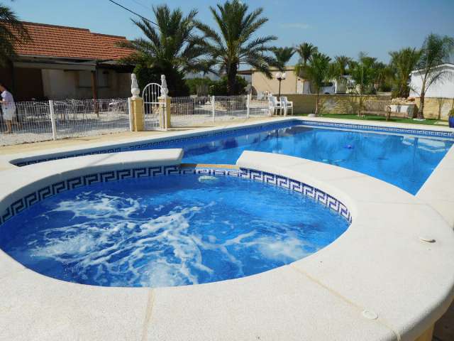 A great 2 bed Atlas Super Oakwood with decking and outside kitchen