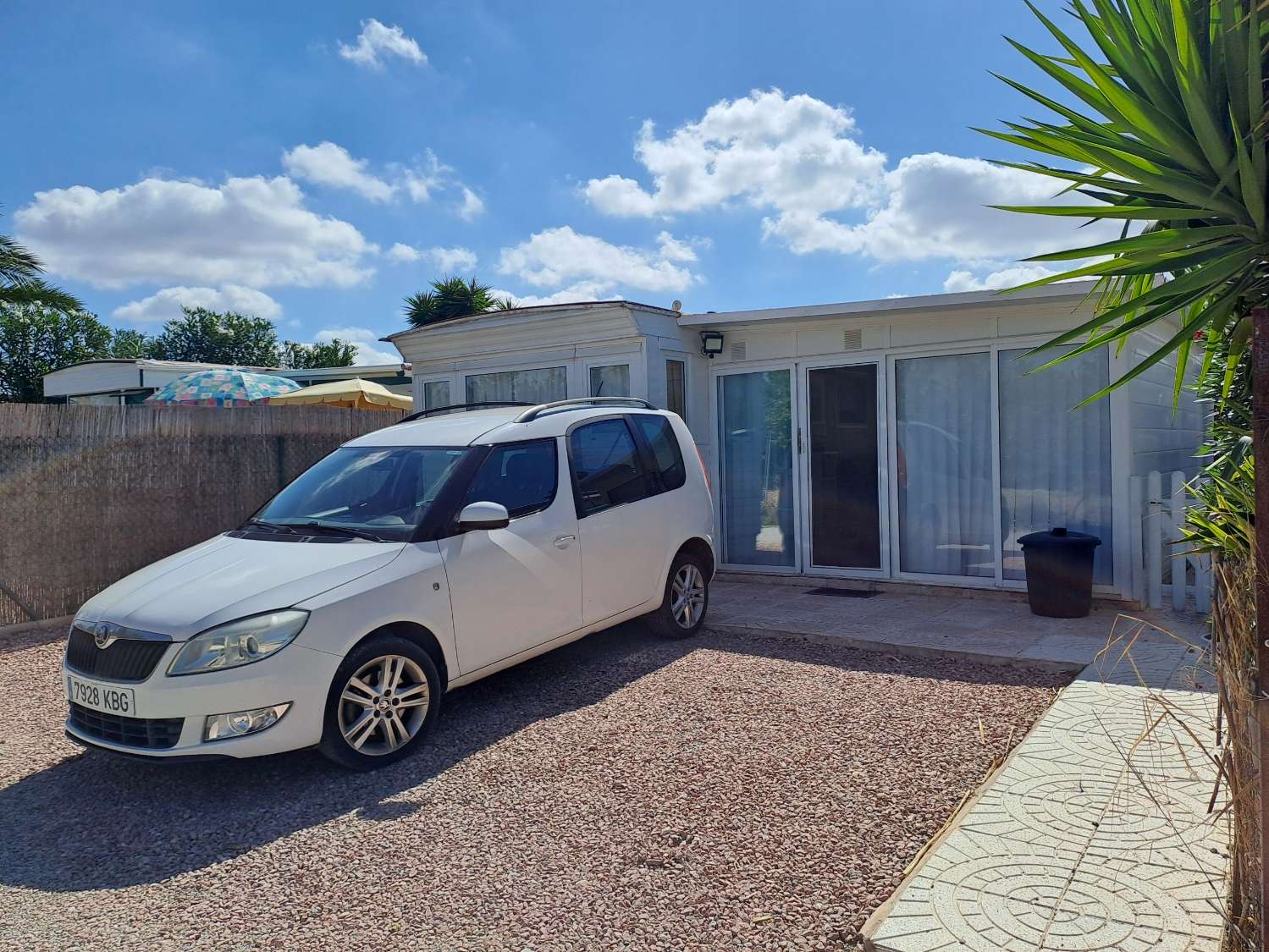 Mobile home with conservatory on private site
