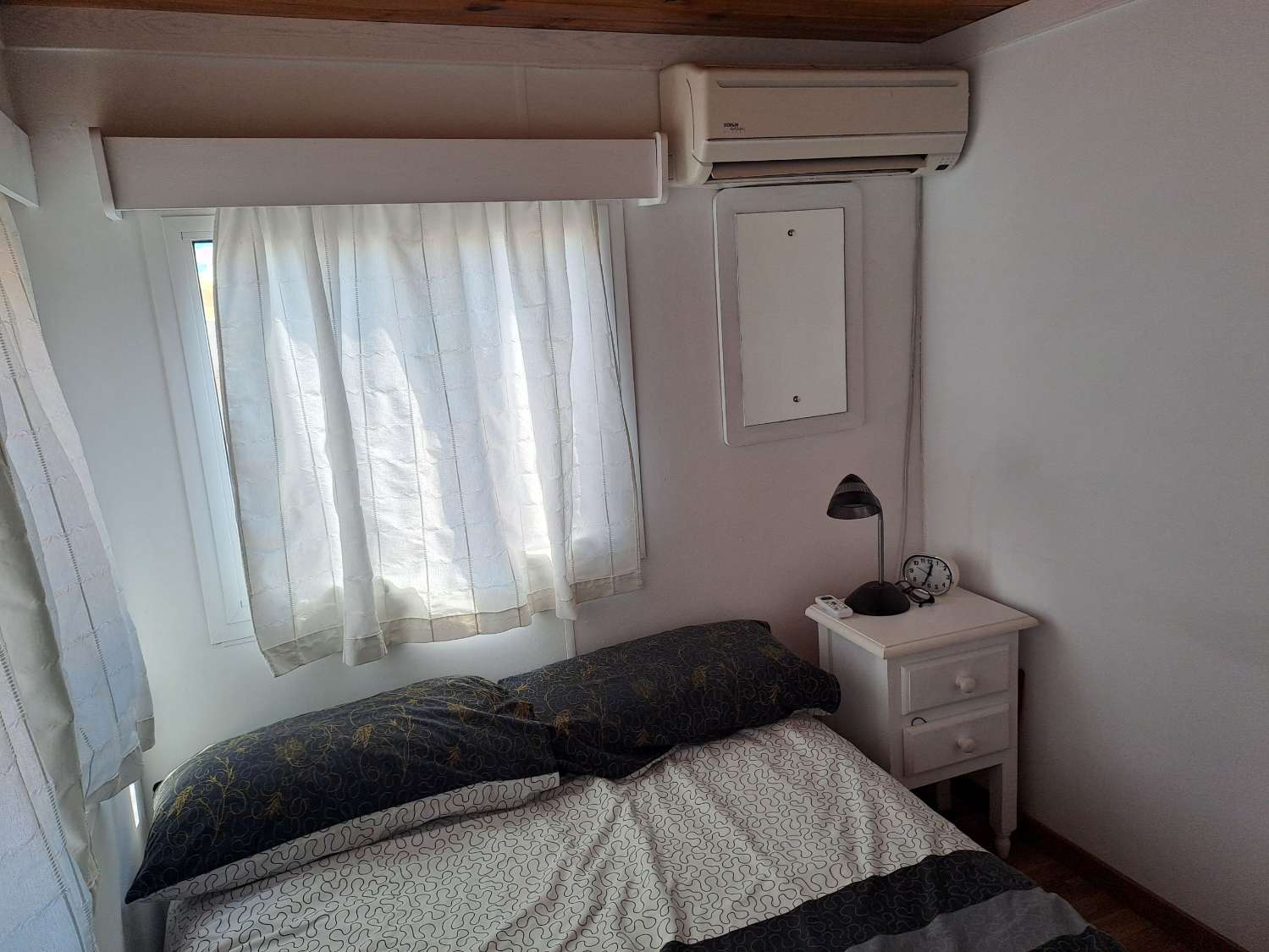 Mobile home with conservatory on private site