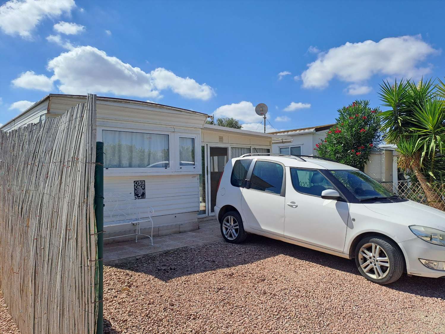 Mobile home with conservatory on private site