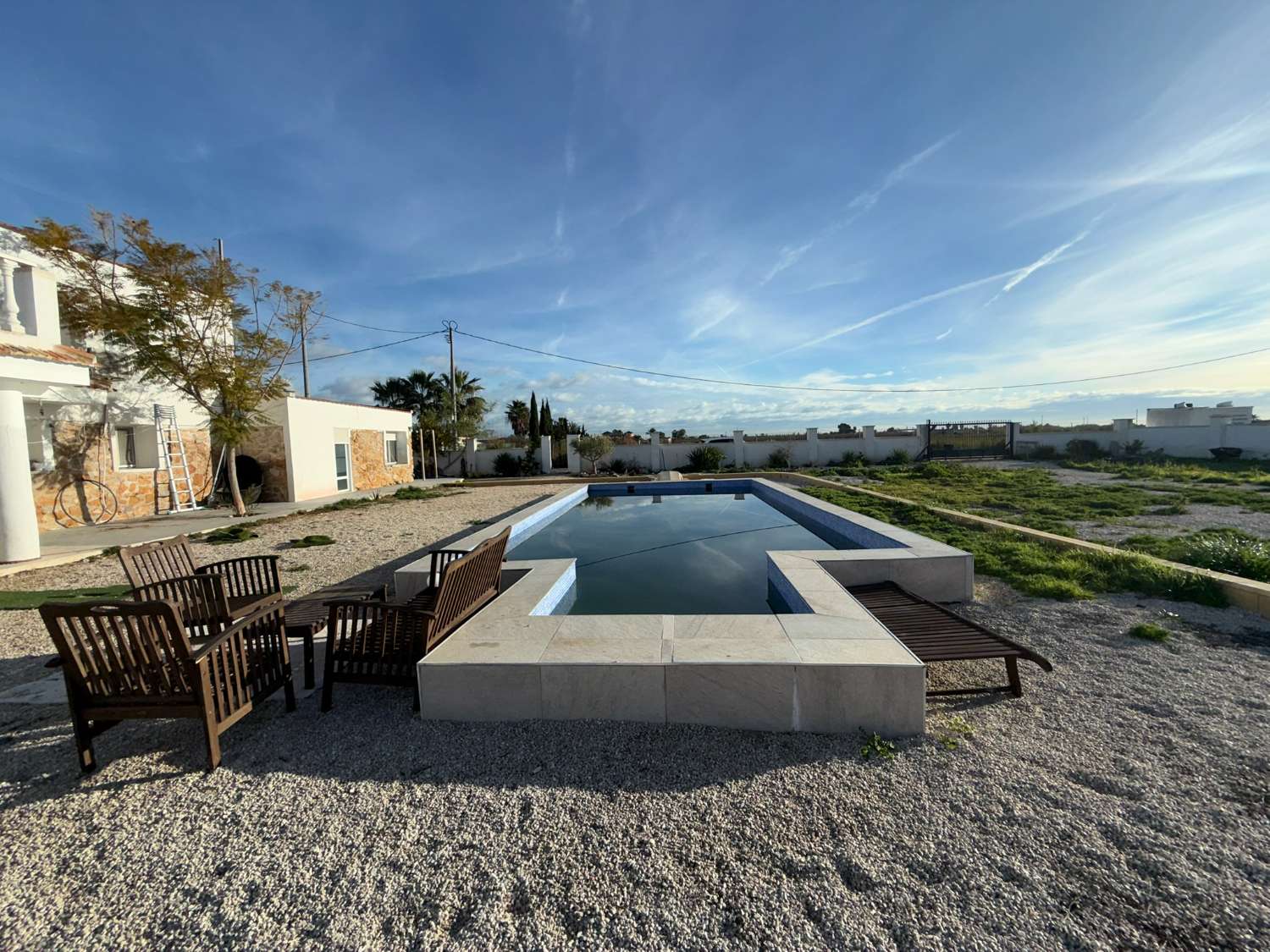 A large country house with pool and mountain views