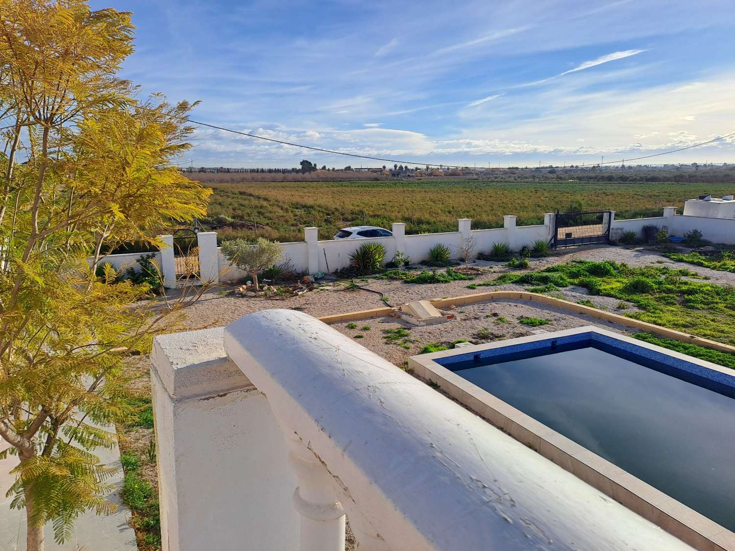 A large country house with pool and mountain views