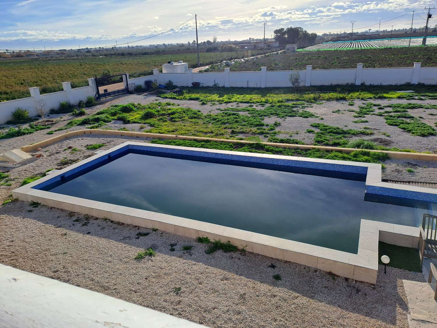 A large country house with pool and mountain views