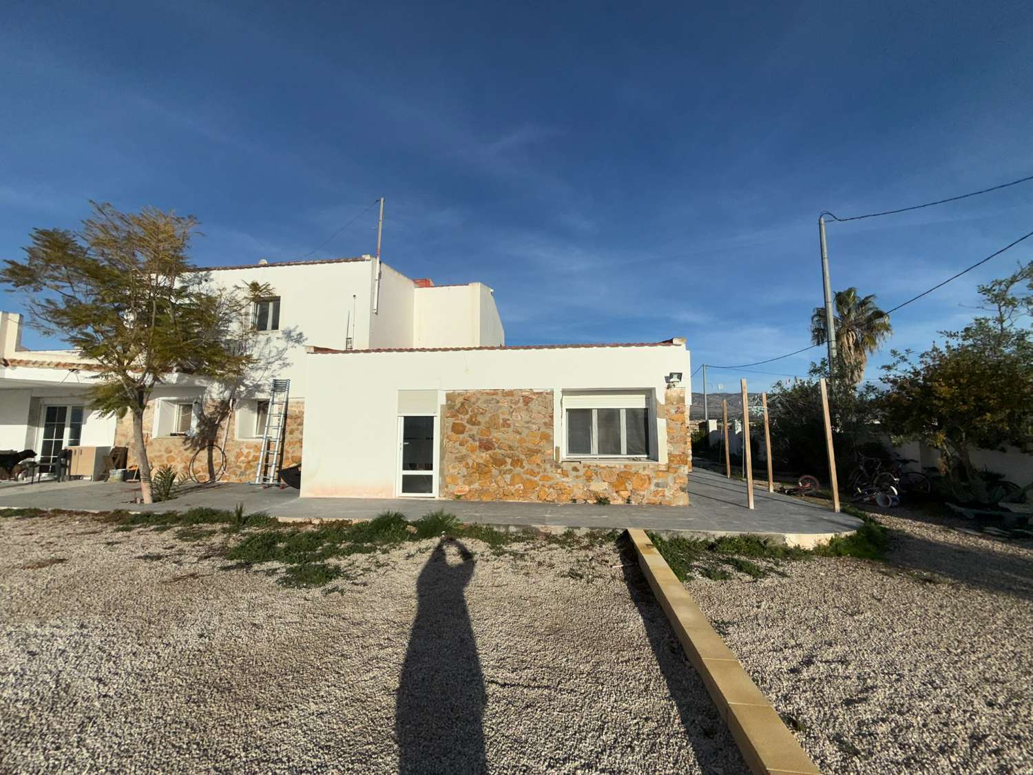 A large country house with pool and mountain views