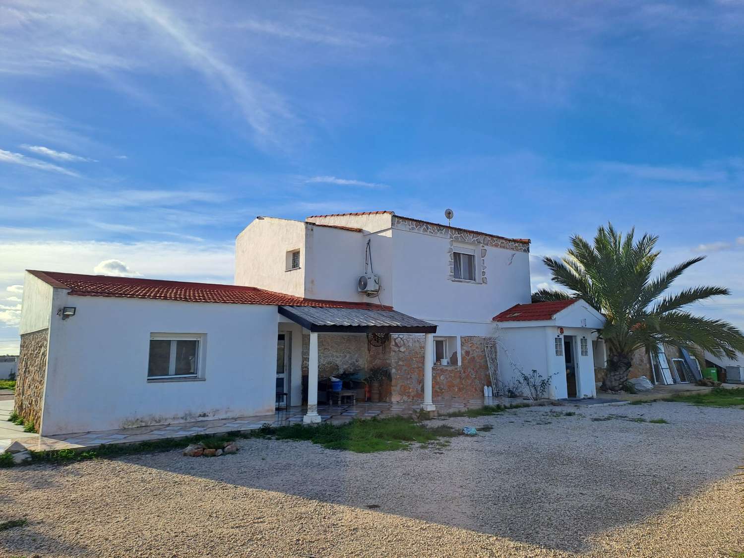 A large country house with pool and mountain views