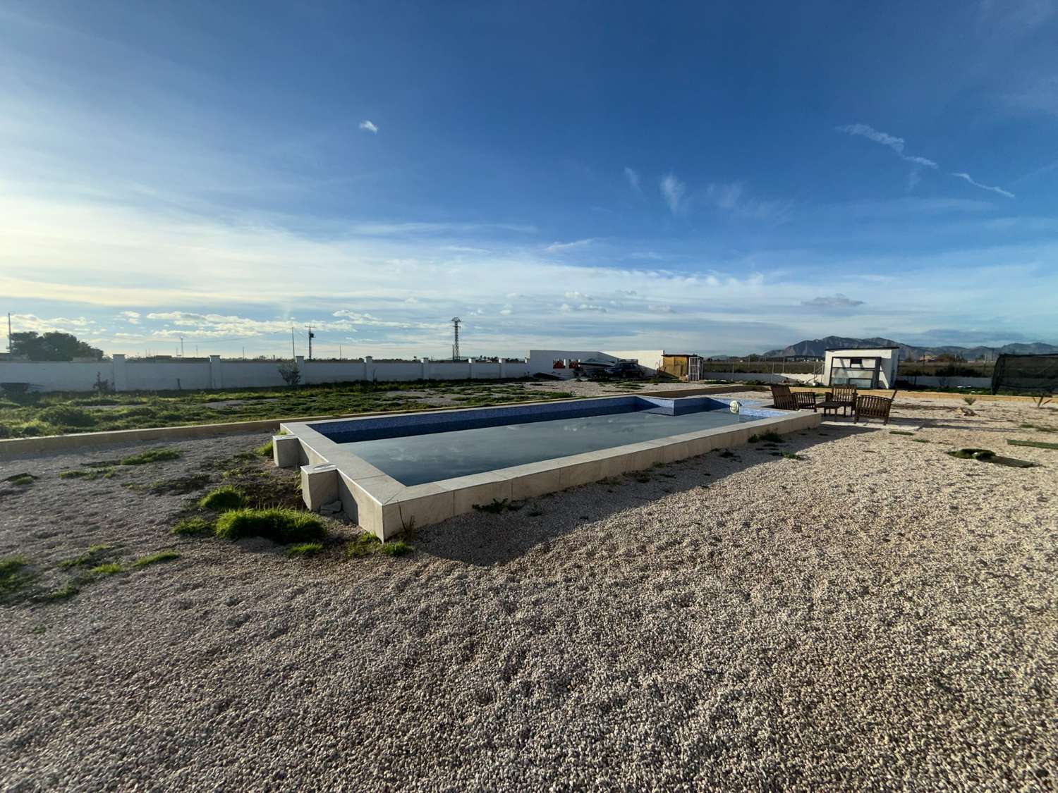 A large country house with pool and mountain views