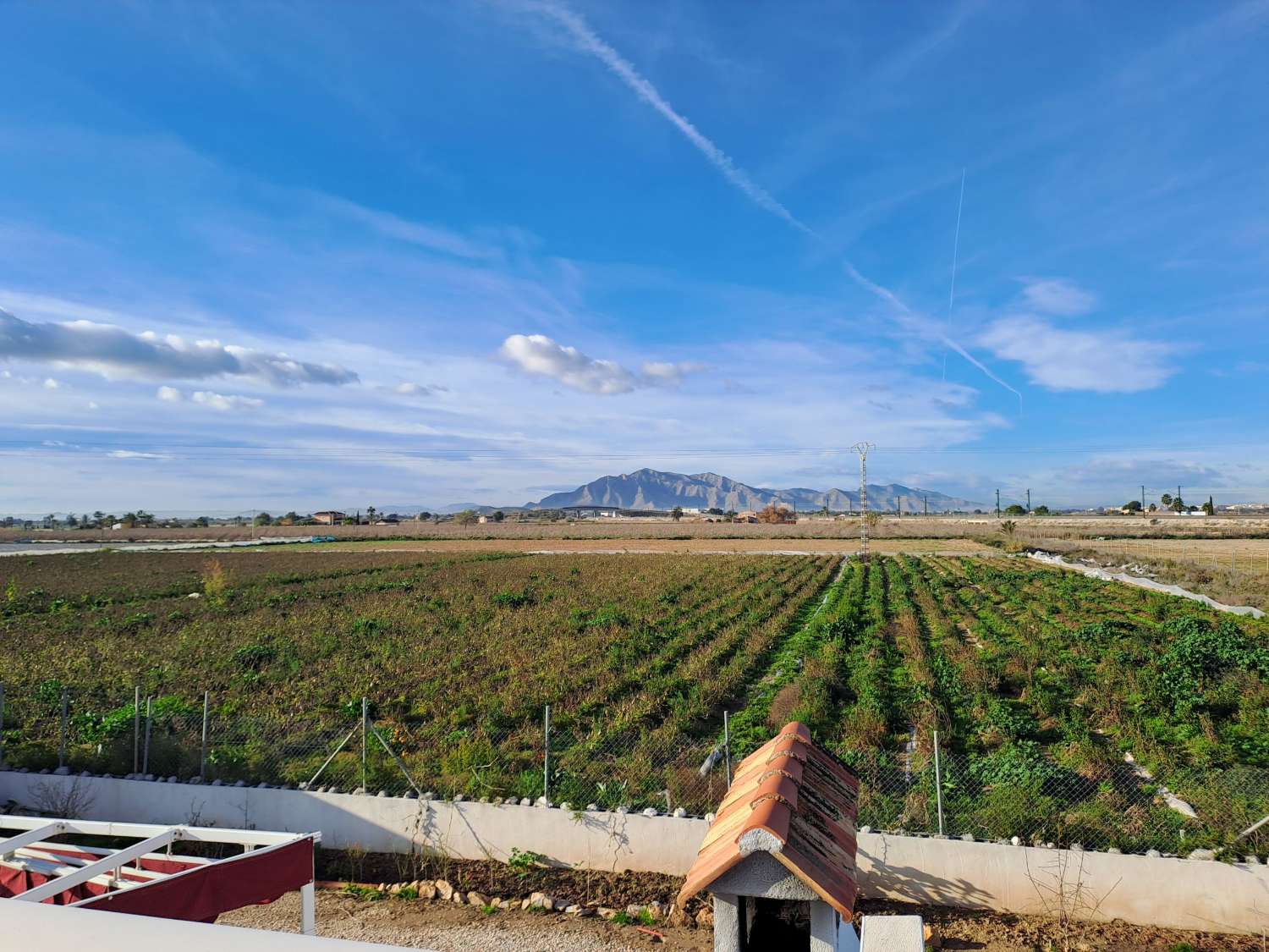 A large country house with pool and mountain views