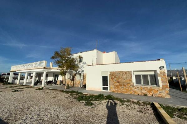 A large country house with pool and mountain views