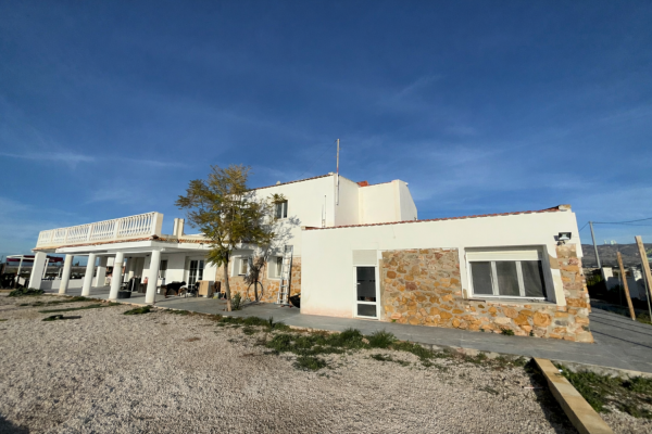 A large country house with pool and mountain views